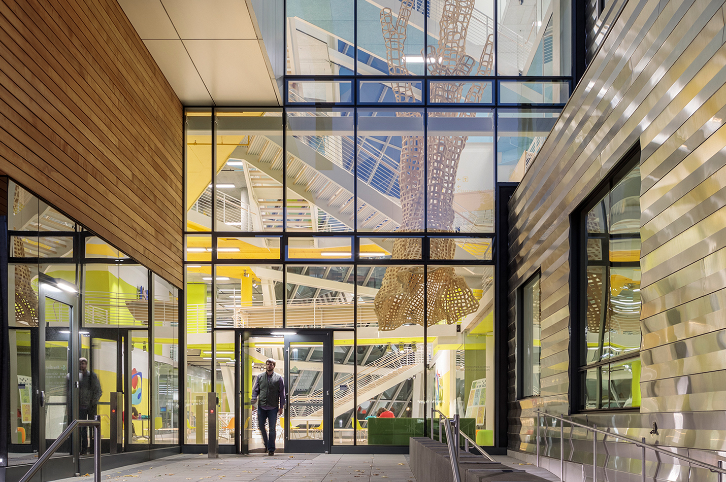 Exterior of a side entrance of the Karl Miller Center at PSU revealing the 5 story atrium