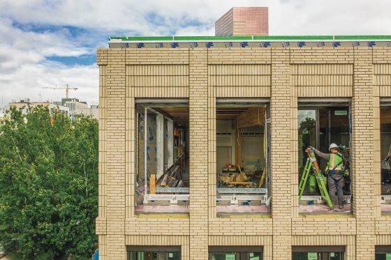 An image of Portland Oregon's Living Building in construction.